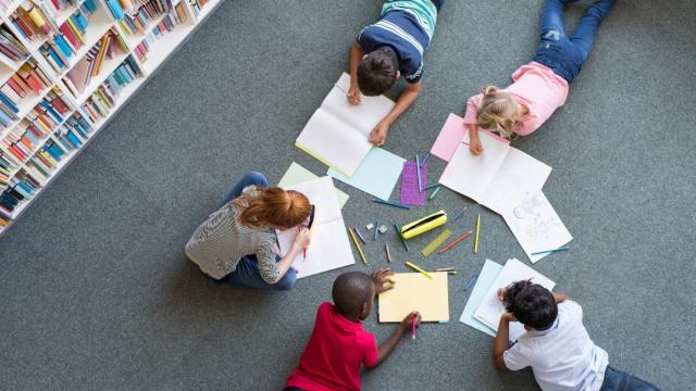 Children learning on the floor